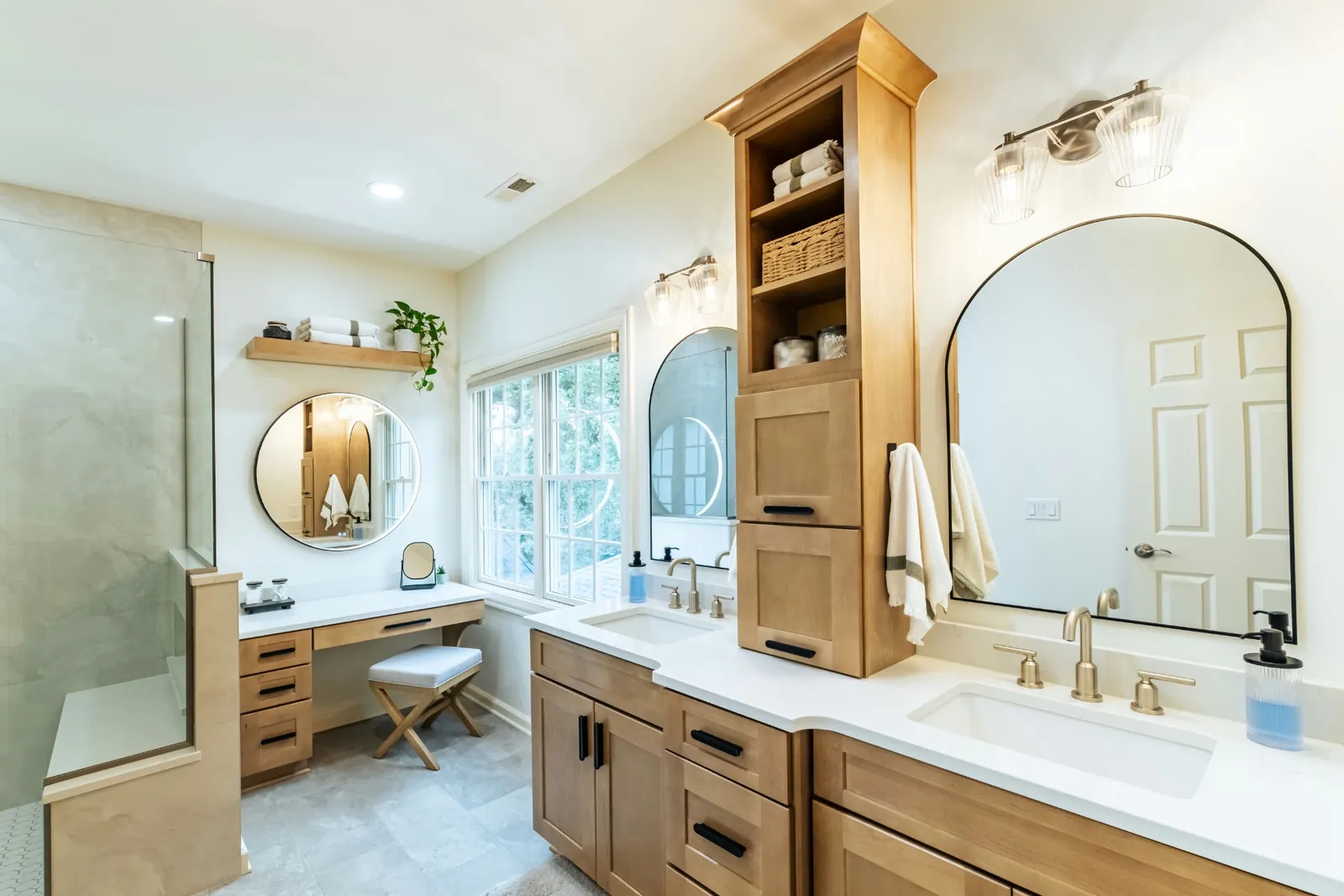 Warm Modern Primary Bath remodel by Gentry Custom Remodeling in Dublin, Ohio